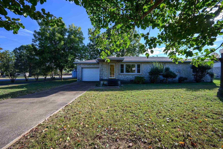 This well-located three-bedroom, two-bath home is situated on approximately 0.25± acres and offers the perfect balance of small-town convenience and comfortable living. The property features a spacious detached garage/shop, ideal for storage, hobbies, or a home workspace. Inside, the home offers a functional floor plan with welcoming living spaces and ample natural light throughout. With a few cosmetic updates, this property presents excellent potential to add value and make it your own. Conveniently located just minutes from schools, shopping, and local amenities, this home provides a peaceful setting while remaining close to everyday conveniences. A great opportunity for first-time buyers or those seeking a home with room to grow.