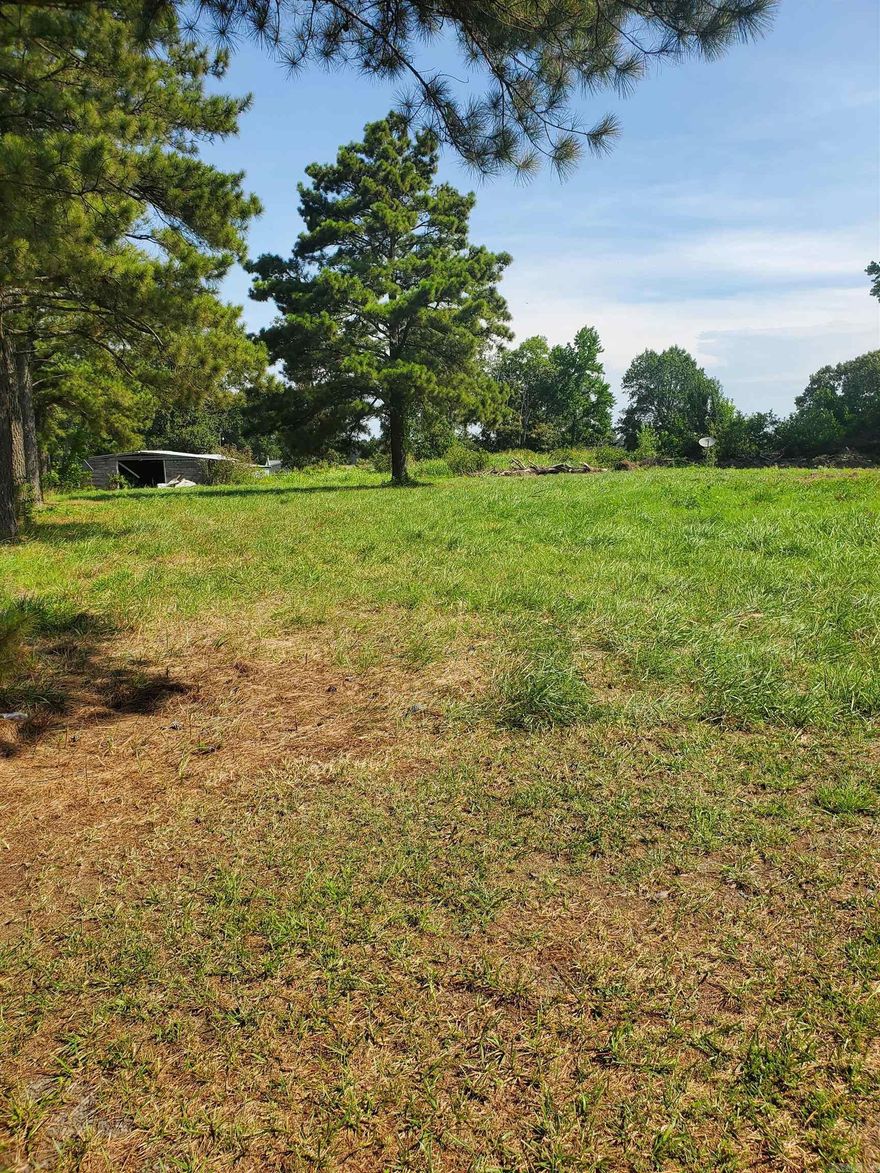 This 3.84 Acres is the perfect place for your new home! Mobiles are welcome! Property is located on between El Paso and Beebe on Hwy 64 West