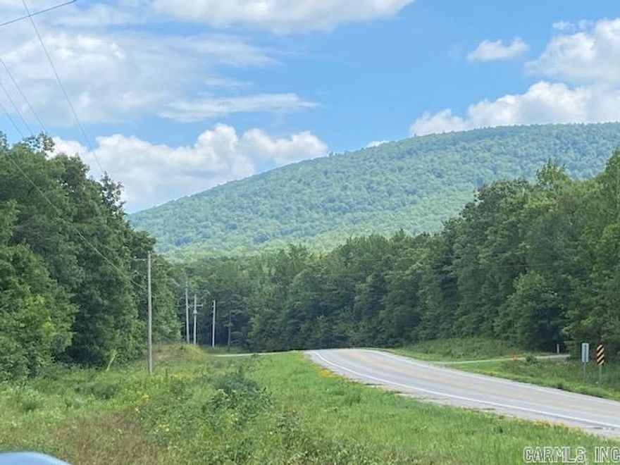 ADVENTURE AWAITS!!! National Forest surrounds this wooded 32.5 acres with the headwaters of the Ouachita River meandering through the valley. Ride, Drive or Hike next door to the Black Fork Mountain trail, less than 1/4 mile. ATV's, bikes, and horses are all welcome here! Hike up the hill on your property to pitch a tent and enjoy the wildlife in the privacy of the National Forest neighborhood. Cyclists and Bikers are welcome! Your new adventure has paved access, too! Highway 270 runs through this valley with Mountain Ridges on both sides, very little private property is available here! Less than a mile to the old country store and a 2 mile drive up to the gorgeous Vistas of Queen Wilhelmina State Park Lodge and Restaurant. Take the Talimena Scenic Drive all the way to Oklahoma! The Ouachita Mountain National Recreation Trail system runs over 192 miles from Oklahoma to Perryville, AR. Watch the train go through and switch tracks next door! This property has been owned and enjoyed by the same family for generations! Come make this your new weekend getaway or a place to call home