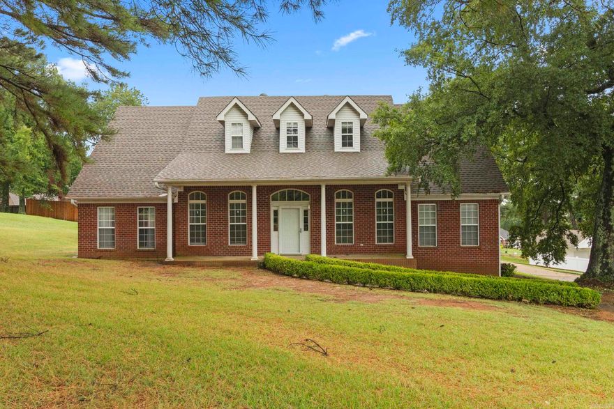 Excellent price per square foot and perfectly positioned on Martin Drive! This move-in ready transitional-style home offers 4 bedrooms and 3.5 baths with a spacious, functional layout. Step from the inviting front porch into a welcoming foyer with tall ceilings, generous rooms, and beautiful flooring throughout. The updated kitchen features new flooring, quartz countertops, backsplash, and appliances, and flows easily into the main living areas. The main level includes a private primary suite with updated bath, two guest bedrooms, a fully renovated hall bath with a walk-in shower, and a convenient powder room. Upstairs offers a fourth bedroom, full bath, and a versatile bonus room ideal for an office, playroom, or media space. Enjoy the airy back porch with pergola, perfect for relaxing or entertaining. Rear-entry garage adds to the custom feel. New roof in 2020. Great location, abundant space, and ready for its next owner!