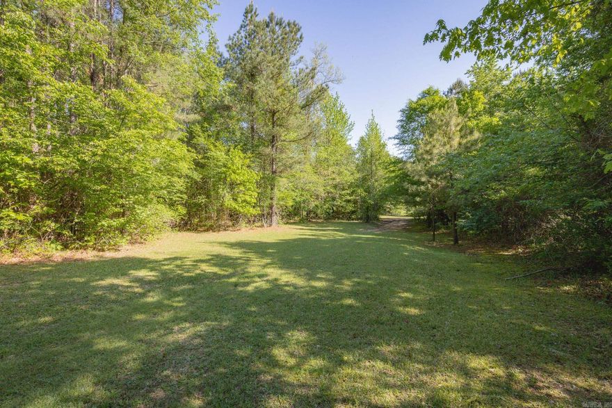 Beautiful 17 acre tract of land featuring a mixture of timber and apprx. 3 acres of cleared areas scattered throughout.  There is a nice cleared area that was once home to an old deer camp.  This property is ideal for hunting, with established shooting lanes or plenty of secluded areas to build your dream home.  Nature lovers will appreciate the creek flowing throughout the northeast section of the property, with a natural underground spring that adds to the land's charm and appeal.  The creek bed offers a mix of sand and gravel! This property is secluded yet conveniently accessible from Grant 8.  Peace and privacy you've been looking for without sacrificing convenience.  Showings by appt only- to serious inquiries.  Potential for buyer to purchase additional 3 acres and mobile home next to it as well.