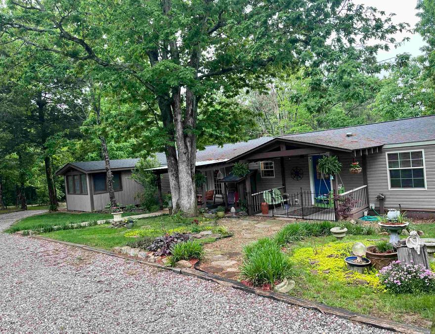 "Welcome to your private oasis! This charming 4-bedroom, 2-bathroom manufactured home is situated on a sprawling 4.94-acre lot, offering the perfect blend of space and tranquility. The home features a new roof, ensuring peace of mind for years to come. Step outside and discover the serene gazebo, ideal for relaxing or entertaining guests. Stay safe during inclement weather with the included storm shelter.  Additionally, this property boasts two storage/shop buildings - one 10x16 and the other 12x20 - providing ample space for all your storage needs. The meticulously landscaped grounds and gutters enhance the curb appeal of this home, while the covered porches offer the perfect spot to enjoy your morning coffee or watch the sunset.  Don't miss this opportunity to own your own slice of paradise. Schedule a showing today and make this dream home yours!"