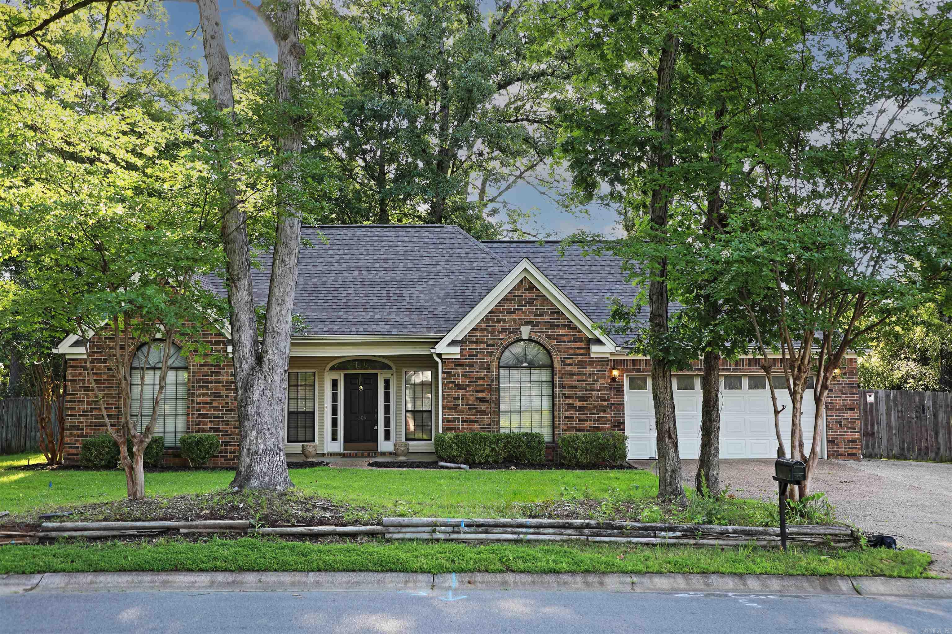 Welcome to this beautifully maintained 3-bedroom, 2-bathroom home located in the desirable White Hall School District and eligible for Rural Development financing—$0 down! Step inside to discover a thoughtfully designed split floor plan featuring newer vinyl plank flooring, and a cozy shiplap accent wall with a gas fireplace in the living room. The oversized master suite offers a private retreat with French doors that open to your serene, fully fenced backyard—complete with a relaxing waterfall feature and plenty of space to unwind or entertain. The kitchen is equipped with a double oven and plenty of cabinetry, while the dedicated grilling deck out back is perfect for cookouts. Other standout features include a 2-car garage with a newer motor and track system, newer roof, and a whole-home generator connection for peace of mind. Enjoy the extra privacy of the oversized backyard with full fencing, and the convenience of nearby schools, shopping, and quick access to local amenities. Don’t miss your chance to own this move-in-ready gem with modern updates and financing options that make it easy to call home! Recent appraisal on file (4/30). Call today for your appointment!