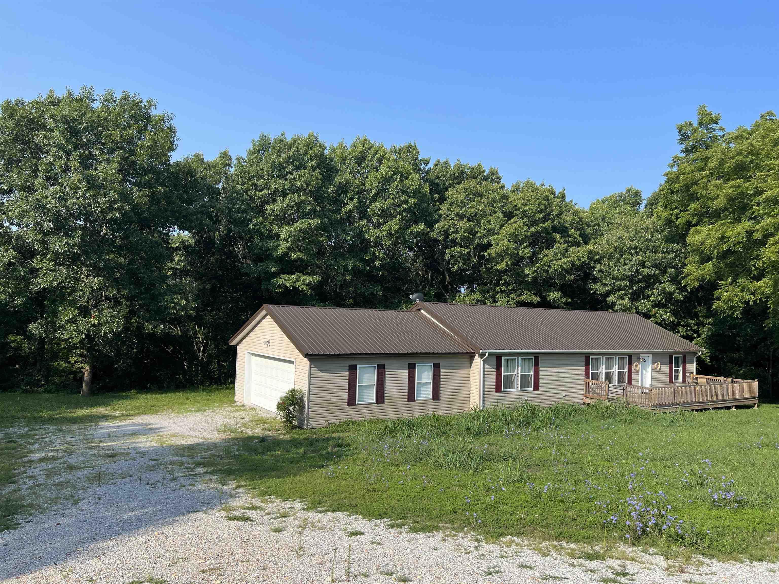 Very nice home with 3 BR, 2 BA, 1,568 SQFT on 1.29 Acres m/l and an oversized 2 car garage 25' x 25'. The home features an open floor plan, laminate and tile flooring, 3 decks, walk-in pantry, nice master suite, and so much more. Conveniently located between Branson, MO and Harrison, AR. Schedule a viewing today!
