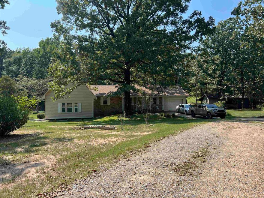Beautifully transformed 3 bed 2 bath home on 5.73 acres with updates that include new flooring, paint, gutters, hvac air return, windows, doors, water heaters, sheetrock dishwasher and more!  This spacious home also has a laundry/utility room and a loft overlooking the den. Outdoors you will find parking for an RV, storage shed, horse barn and a 24x30 shop, a back deck perfect for enjoying your morning coffee or an evening sunset.  There is septic, water and electrical hook ups for a mobile home if one was needed to be added on the adjoining pasture.  Call today and don't miss the opportunity to see this gorgeous home on acreage.