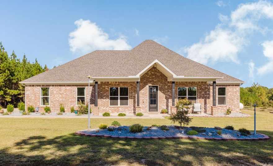 Its The View!! This home is better than it was New! Country living while close to town for shopping, restaurants, church, schools, and etc! Enjoy watching the  wildlife while sitting on the fantastic back porch or soaking in the Hot Tub. The back yard is truly an oasis, featuring landscaping with fruit trees and raised garden. While inside, you have a fantastic kitchen and a Huge Pantry. Cabinets in kitchen include fresh paint and pull outs for cookware. Large bedrooms with ample closet space for organization. Master closet even has entry to laundry room, this is genius. Outside also includes 30X20 Barn with 2 bays and electricity, concrete floors & shelving. Plenty of space for lawn care items, workshop area, holiday storage, just some ideas. Call today for your private showing.