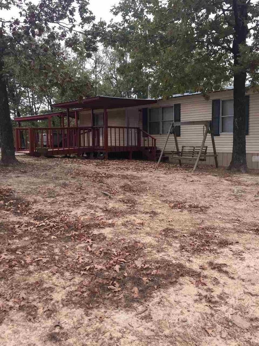 Minutes from Down town Bigelow. This well kept double wide has a permanent foundation on acres of beautiful rolling hills. Life in the country can't get much better than this. 3 bed 2 bath, washroom, washer, dryer and refrigerator to convey with the house.