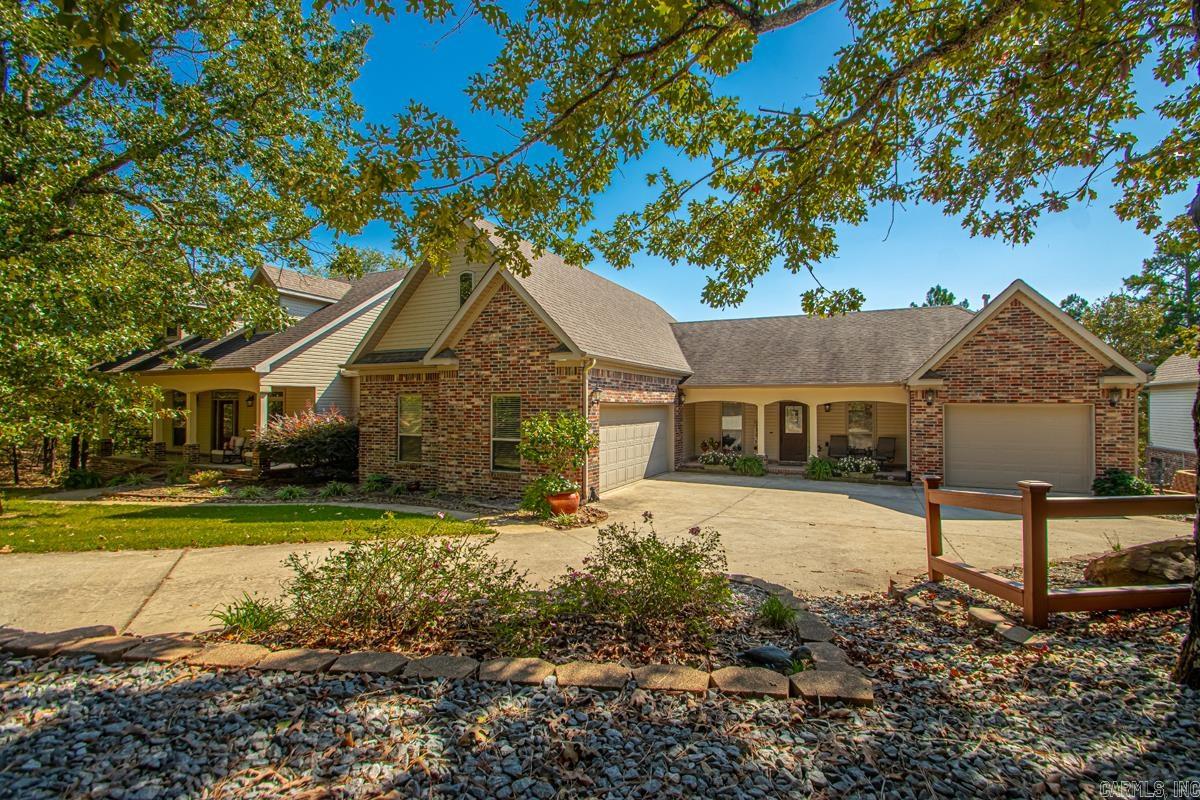 Gorgeous custom built home w/ true IN-LAW QUARTERS attached to home! (meets ANSI Standards). When you walk through the front door from the big front porch you will be thrilled w/ all the upgrades! Tall ceilings! Crown moldings! 2 sided gas log fireplace! Wait until you see all the trees! Lots of windows flood the space w/light and nature! The kitchen has many wood stained cabinets! Every cook is going to love it! Big island! Eat in kitchen area & breakfast bar! Beautiful! Office! Split bedroom plan. Go through the laundry room and enter the in-law qtrs! Full kitchen, den w/ corner fireplace, office space, bedroom, full bath, its own laundry room & one car garage! Separate entry also! Hard to find! Upstairs~Gym and bonus room w/1/2 bath! Floored walk-in attic to get lost in! Under the house is walk in storage! Bunker for storms! 24X36+-SHOP!! Decking in the back wraps the entire back side! Everything everyone could need & love to have! You won't believe it! You just won't believe it! See agent remarks..