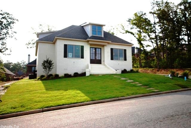 Great buy in this new home, built by Mike Kuhn. The Foyer is flanked by a Study/Office and Formal Dining Room. The large open Great Room features an informal dining area and flows into the custom kitchen with all S/S appliances including a large built in ref. The Powder Bath is just off the Great Room. The Master Suite is spacious and features a luxury bath and closet. Upstairs are three large bedrooms and bath. Other features include a covered porch and side entry garage off a private alley.