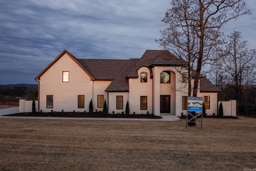 After you pull through the grand gatehouse entrance of Waterview Estates you will find this home sitting across the street from all the neighborhood amenities such as pickleball courts, tennis court, basketball court, football and soccer field, as well as miles of nature walking trails and a community bonfire area. This home backs up to a beautiful view overlooking a mountain range, valley, and the beautiful Lake Maumelle.