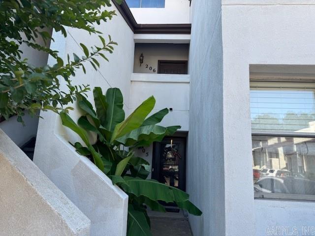 Great condo located conveniently close to the Heights and the Mid-town areas. Vaulted Great Room, loft bedroom with private bath and good closet storage. Laminate flooring on main level with primary bedroom and bath, pantry with laundry and separate dining area. Wood-burning fireplace, great deck off living room that overlooks woods. Fee over exterior, water, trash/recycle, grounds, roof, termite & pool. POA docs are in MLS.