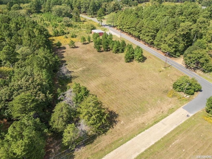 If your looking for land in Lake Hamilton School District..Look at this great place to build you new home! This is on the corner of Amity Road and Veranda Trl. Its cleared and per seller says he has had a perk test.  The land is 2.79 +/- and ready to start building. Its accessible from 7 South and South Moore offf of 70W for getting to LHHS. Property is first lot on right at the entrance of Veranda and start ends at cul-d-sac. You'll be proud to build in an area of very nice homes.