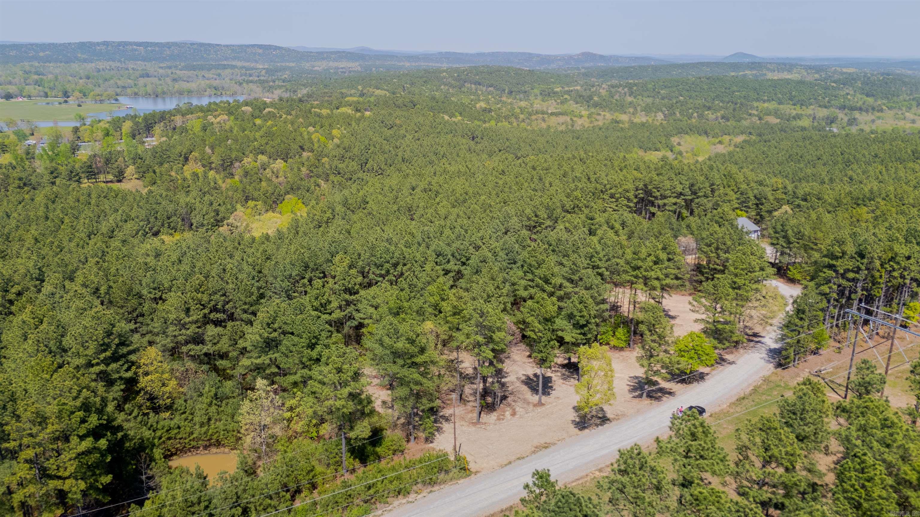 BUILD YOUR DREAM HOME ON 3 ACRES IN PRIME LOCATION. EASY ACCESS TO HOT SPRINGS VILLAGE THROUGH GLAZYPEAU GATE--ASK ABOUT HSV PRIVILEDGES FOR THE BEST OF BOTH WORLDS! COVENANT PROTECTED AREA WITHOUT HOA FEES! HORSES ALLOWED!