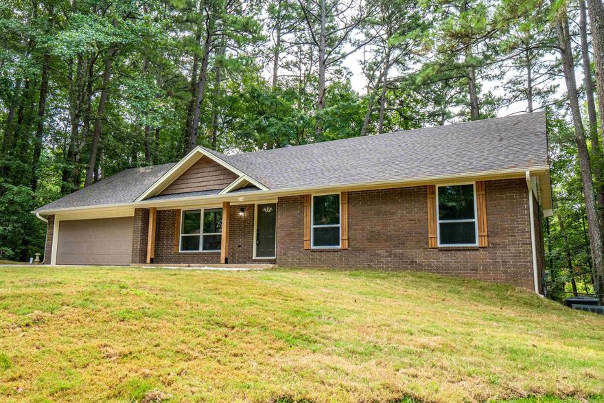 Discover this beautifully updated home with over 3,000 square feet, featuring 6 bedrooms and 3 bathrooms with a thoughtfully designed layout. The walk-out basement offers its own living area, with 3 bedrooms upstairs and 3 bedrooms downstairs for maximum flexibility.  Recent updates include a new roof, new windows, new deck, new driveway, brand-new appliances, custom cabinets, and an on-demand tankless water heater—move-in ready with modern comfort in mind.  Nestled on a cul-de-sac surrounded by mature shade trees, this incredible home checks all the boxes—space, updates, and a prime location! Schedule your showing today!   Listing agent has an ownership interest.