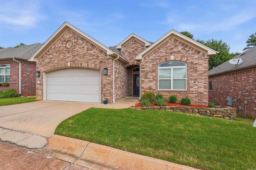 Charming, well maintained patio home in a gated community featuring hardwood floors throughout the main living areas, slab granite countertops, high ceilings, elegant crown molding, stainless steel appliances, and beautiful primary bath. Spacious open floor plan with floored storage space beneath the home. Enjoy the large deck, iron fencing, and a private backyard overlooking peaceful green space.
