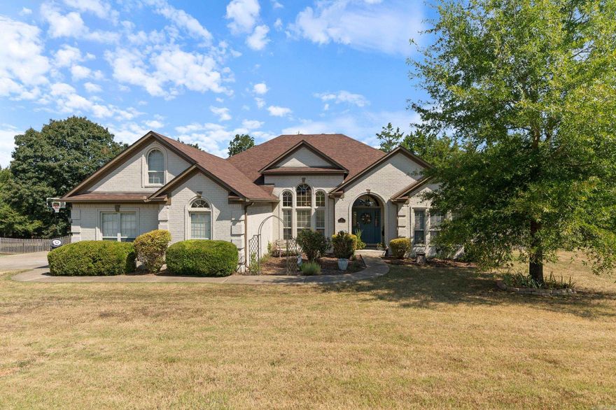Welcome to 11 E Chateau Estates in Greenbrier, Arkansas, located in the desirable Wooster area on a quiet cul de sac.  Buyers searching for spacious homes in Greenbrier AR will appreciate the flexible layout, updates, and private setting this property offers. This 4 bedroom, 3.5 bathroom home provides space for everyone, with up to 5 bedrooms including a main level office with glass door and closet.  The main level features 3 bedrooms with a convenient Jack and Jill bath, while upstairs offers a large bonus room or bedroom with its own full bath. The primary suite is a true retreat with a fireplace, sitting area, and two closets. Enjoy outdoor living on the large deck overlooking a huge tree lined backyard that offers added privacy. Updates include a new roof in 2024, updated HVAC systems with transferable warranties, new kitchen countertops, updated flooring, fresh paint, and recently serviced septic system. Located in Greenbrier’s top rated school district with a peaceful neighborhood feel, this home offers space, function, and value in a sought after area. Schedule your private tour today and see why this home stands out. Agents see remarks.