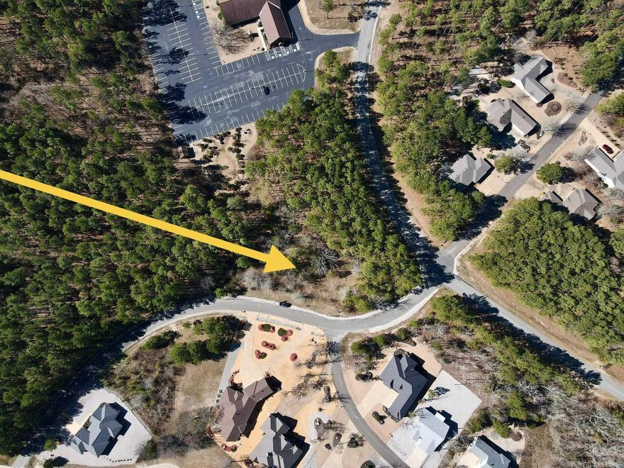 Easy to build level lot with a large section of common property behind it. Across street from Isabella Golf Course and right by the East Gate for easy access! New Member Buy-in Fee due at closing.
