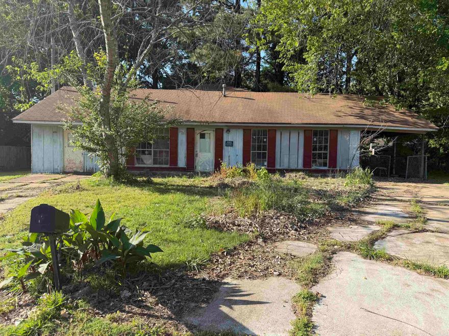 Unlock incredible equity growth. This property sits on a solid concrete slab foundation with low-maintenance vinyl/aluminum siding and features a massive 960 sq. ft. concrete driveway with an attached carport. The property is being sold AS-IS, currently needs to be cleaned out, and requires some TLC, presenting the perfect blank slate for investors, flippers, or savvy buyers to design a highly profitable 3- or 4-bedroom layout from scratch! Can be sold as a package along with 403 Fussell, 611 Westview, 2148 Laurel, 651 Laughrun, and 253 Beech Grove or separately.
