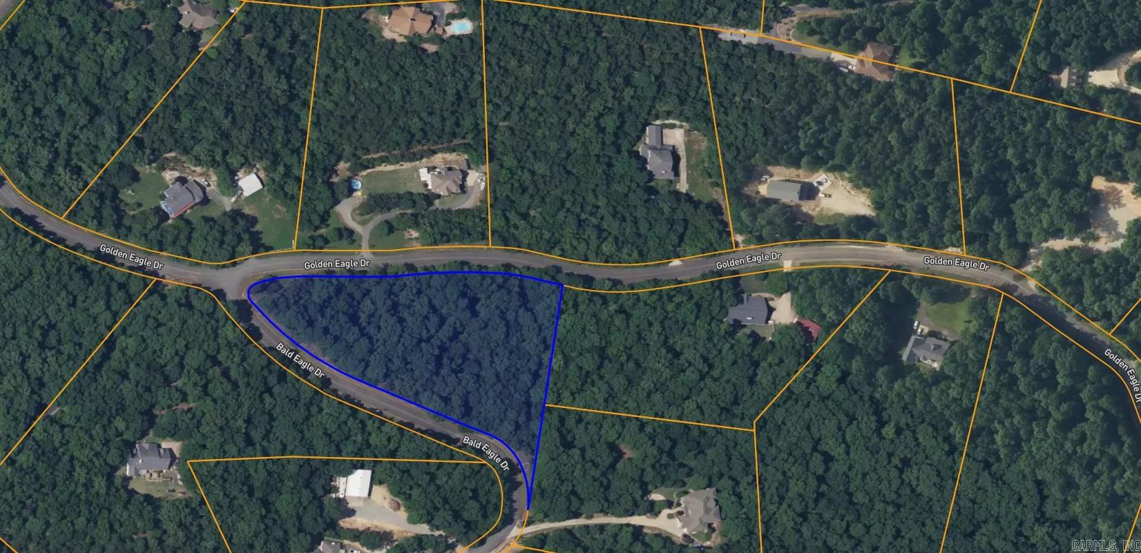 Discover the perfect canvas for your future home with Lot 26, a beautiful 3.04 wooded acre parcel located in the exclusive Eagle Ridge Estates community in Ferndale. This prime piece of land offers the ideal balance of privacy, natural beauty, and convenience, making it one of the most desirable lots available in the area. Eagle Ridge Estates is known for its stunning landscapes, high-end homes, and peaceful surroundings. With underground utilities, paved roads, and protective covenants, youāll enjoy both luxury and lasting value. Located just minutes from West Little Rock and Highway 10, you're never far from shopping, dining, and top-rated schools, while still enjoying the serenity of country living. Chenal Elementary and Joe T Robinson schools. Great Location for building your dream home! Come check it out today. Look for the sign at the stop sign of Golden Eagle & Bald Eagle. Driveway on the Golden Eagle Side.