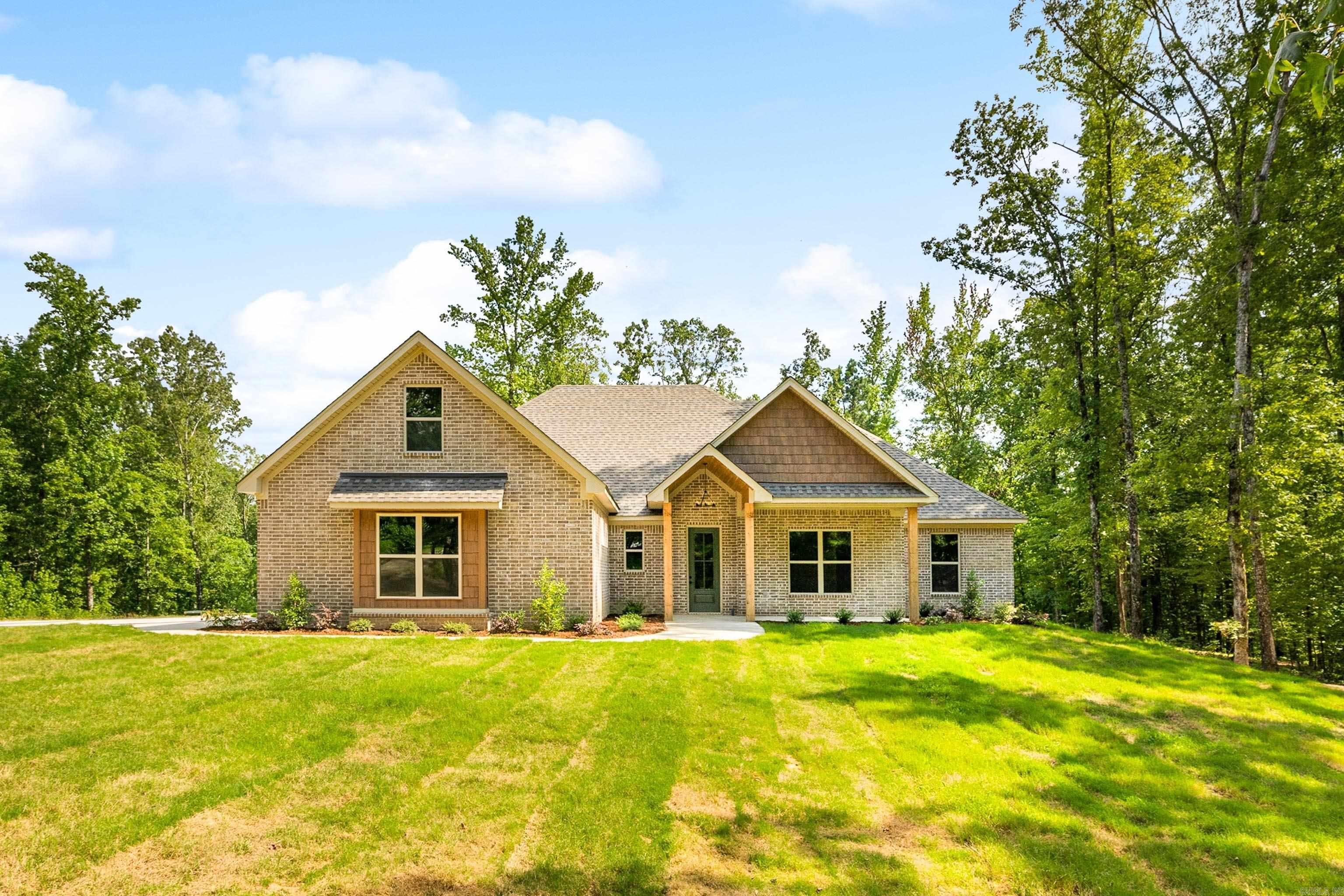 Perfect New construction home with lots of space and plenty of room on 2.5 acres. This home is beautiful and a must see! Open kitchen with large island, custom cabinets, wood burning fireplace, wood beams, large walk in pantry, large primary suite with wood beams and walk in closet & bath. Upstairs bonus room with 1/2 bath. This home has so many custom features! The backyard is beautiful and has lots of space and privacy.