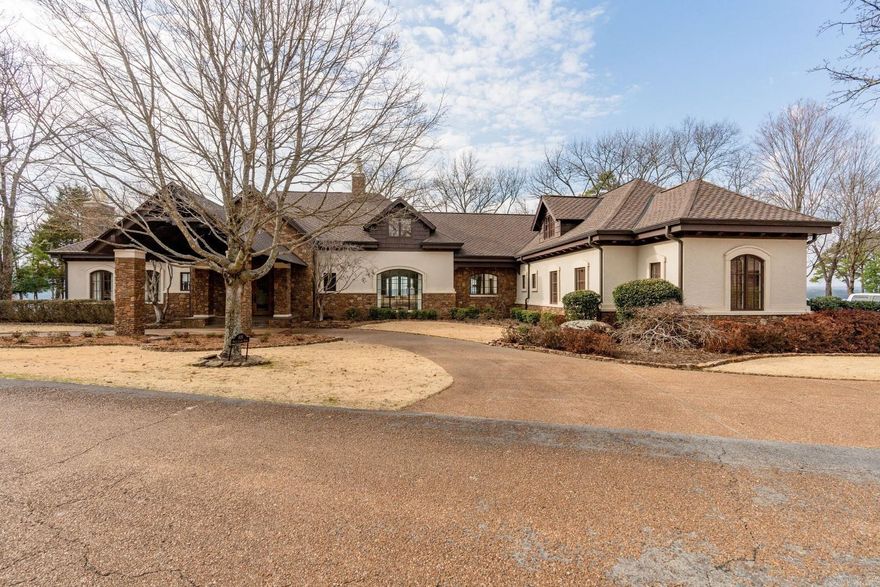 Luxurious Eden Isle FURNISHED home with incredible sunset views of Greer Ferry Lake! Built in 2002, and then completely remodeled in 2018, this exceptional home includes travertine floors inlaid with wood, marble countertops, a very large master suite with lake view, fireplace, jet tub and walk-in shower. Viking appliances, screened porch with outdoor grill, spacious patio with great views and fireplace, bar area and wine cellar, office, 2-car garage, golf cart garage and much more! This property is in absolutely perfect condition!  5-minute golf cart ride to Eden Isle Marina!