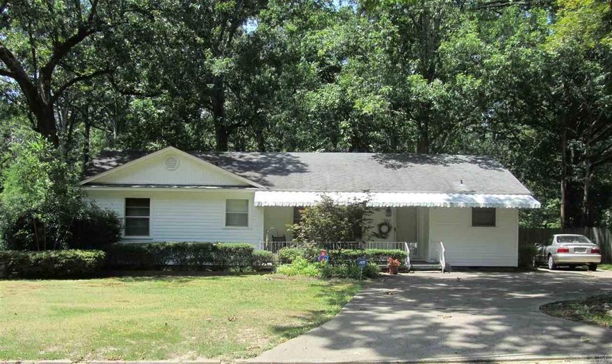 This Charming 3 Bedroom & 2 Bath Home has 1,500 sf and is Move in Ready with an Updated Kitchen and Two Bonus Rooms. This Family Home is on a Large Private Wooded Lot with Mature Trees & Green Space to Rear. Both Front Porch and Back Deck are Covered. Great Outdoor Storage includes: 4 Stall Pole Barn Perfect for Storing Camper/Boat/ATV.etc. Well Established Neighborhood within Walking Distance to Western Hills Elementary School & Western Hills City Park (Fishing Pond, Open Space/Field, Walking Trails, Etc.)