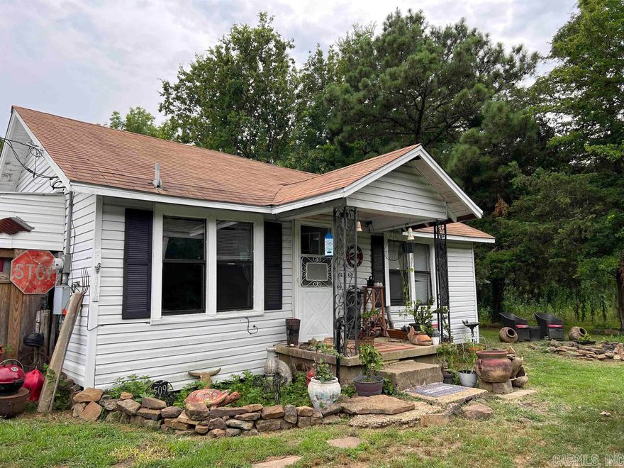 Attention First time homebuyers and/or Investors looking for a great rental property opportunity!!! Come take a look at this cozy house located on the outskirts of Atkins. This is a 3 bedroom, 1 bath home located on appx half of an acre. The carport has been converted to a shop area but could be converted back if a buyer wanted to do that. Come see some of the original charm in this house such as the shiplap ceiling in the master bedroom!! Home is being SOLD AS IS - NO REPAIRS. Agents see remarks.