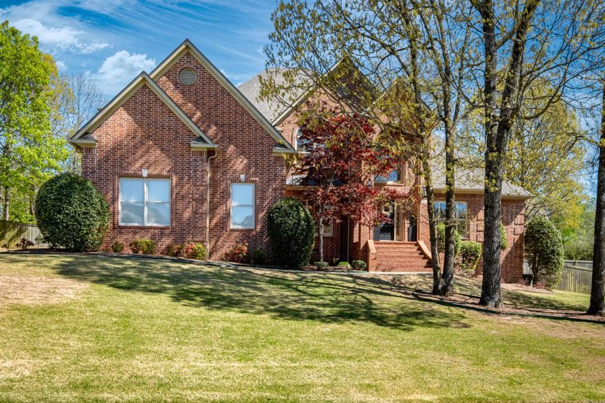 Lovely brick traditional family home offering versatile floor plan. 2 Story entry and family room, cozy hearth room with open floor plan. 3 Living areas, 2 fireplaces, oversized dining room, plantation shutters, optional 5th bedroom or office on main level. Chef's kitchen - island, stainless appliances, Bosch dishwasher, double oven, gas cooktop, breakfast bar. Large master suite - tray ceilings. Upstairs complete with game room and mini- kitchen. Roof 2023, sprinkler system, surround sound, great storage. Large backyard with spacious deck. Enjoy neighborhood pools. Beautifully maintained!