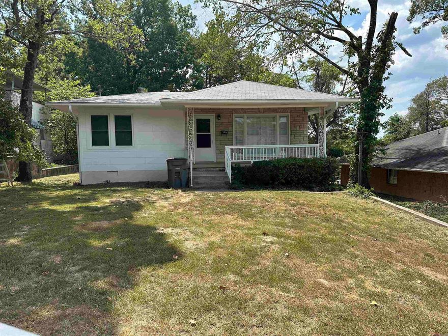 2-1 close to downtown with a partial view, it’s in the first subdivision in Hot Springs. Hill Wheatley’s house is across street. Only a handful of homes in the middle of town have a view of downtown this is one of them. Good street. Good bones. Updated and turn key. Stainless appliances, hardwood and tile flooring, marble countertops, bonus basement with heat and air. I lived there for years its a good home I hate to sell it but I live in Texas and it’s hard to manage from here. One of the best 2-1s in the middle of town in my opinion. Everyone who I rent it to loves it.
