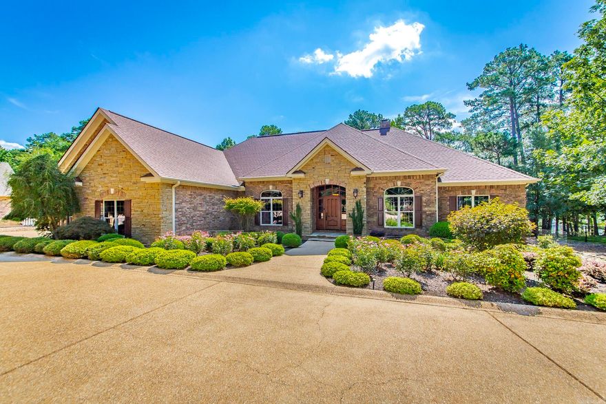 Experience the pinnacle of lakefront luxury in this masterfully crafted home, designed with meticulous attention to every detail. Enjoy the ultimate waterfront lifestyle, a deeded boat slip in Grand Isle Dock—featuring a new lift for your convenience is also available for purchase. Custom alder wood cabinetry graces the kitchen & bathrooms. Imported Brazilian interior doors & a striking custom-built mahogany front entrance welcome you in style. Two primary suites offer privacy & comfort, while a bonus room upstairs serves perfectly as a den, home theater, or bedroom. The existing half-bath can be easily expanded to a full bath. Enjoy high-end appliances, including a built-in Miele coffee machine. The walk-in wine cellar is temperature controlled—a Wine Connoisseur's dream. Every interior wall is insulated for superior quiet & energy efficiency, 2 lifetime warranty water heaters ensure a worry-free experience. Oversized two-car garage plus a separate attached garage/workshop. Enjoy comfort & efficiency w/ the brand new dual zone geothermal HVAC unit. New high-end composite decking & railing. Could be sold furnished. See Agent remarks. Relax & entertain overlooking Greers Ferry Lake.