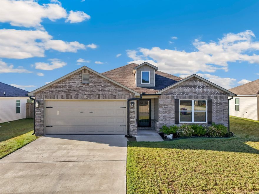 Welcome to your dream home! This beautiful newly built residence, completed in 2023, offers modern living with an array of upgrades and features. Located just outside Conway city limits in a quiet and safe neighborhood, this property is ideal for families and pet owners. A premium Anderson door enhances both security and aesthetic appeal. Be greeted by a beautiful entryway that sets the tone for the elegance found throughout the home. Enjoy a sense of space and openness with 9ft. ceilings throughout. The home is adorned with high-quality paint for a polished and durable finish. Stylish and functional kitchen cabinets provide ample storage, and the stainless-steel appliances add a sleek and modern feel. Durable and attractive luxury vinyl plank flooring throughout and an added touch of softness with carpet in the bedrooms. Unwind in the evenings with stunning views that provide a serene backdrop for relaxation. The large, fully fenced backyard is perfect for outdoor activities, gardening, or entertaining guests. Professionally installed seamless gutters ensure efficient water drainage and peace of mine. Don't miss out seeing this one! Check out the 3D tours and drone footage.