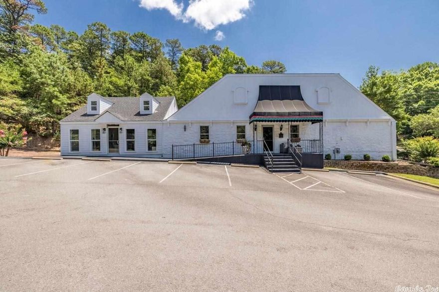 ***INVESTORS/BUSINESS OWNERS*** COMPLETELY RENOVATED OFFICE BUILDING IN WEST LITTLE ROCK. 3800 SQUARE FEET WITH 2 BATHROOMS AND PLENTY OF ROOM TO EXPAND. HUGE PARKING LOT WITH 24 SPACES. LARGE ROAD FRONTAGE WITH 1.55 ACRES! 4 PRIVATE OFFICES, 3 SEATING AREAS, RECEPTIONIST DESK, CONFERENCE ROOM, KITCHEN, STORAGE, OUTDOOR SEATING AND MUCH MORE TO OFFER. PLEASE CALL/TEXT AGENT FOR COMPLETE LIST OF RENOVATIONS