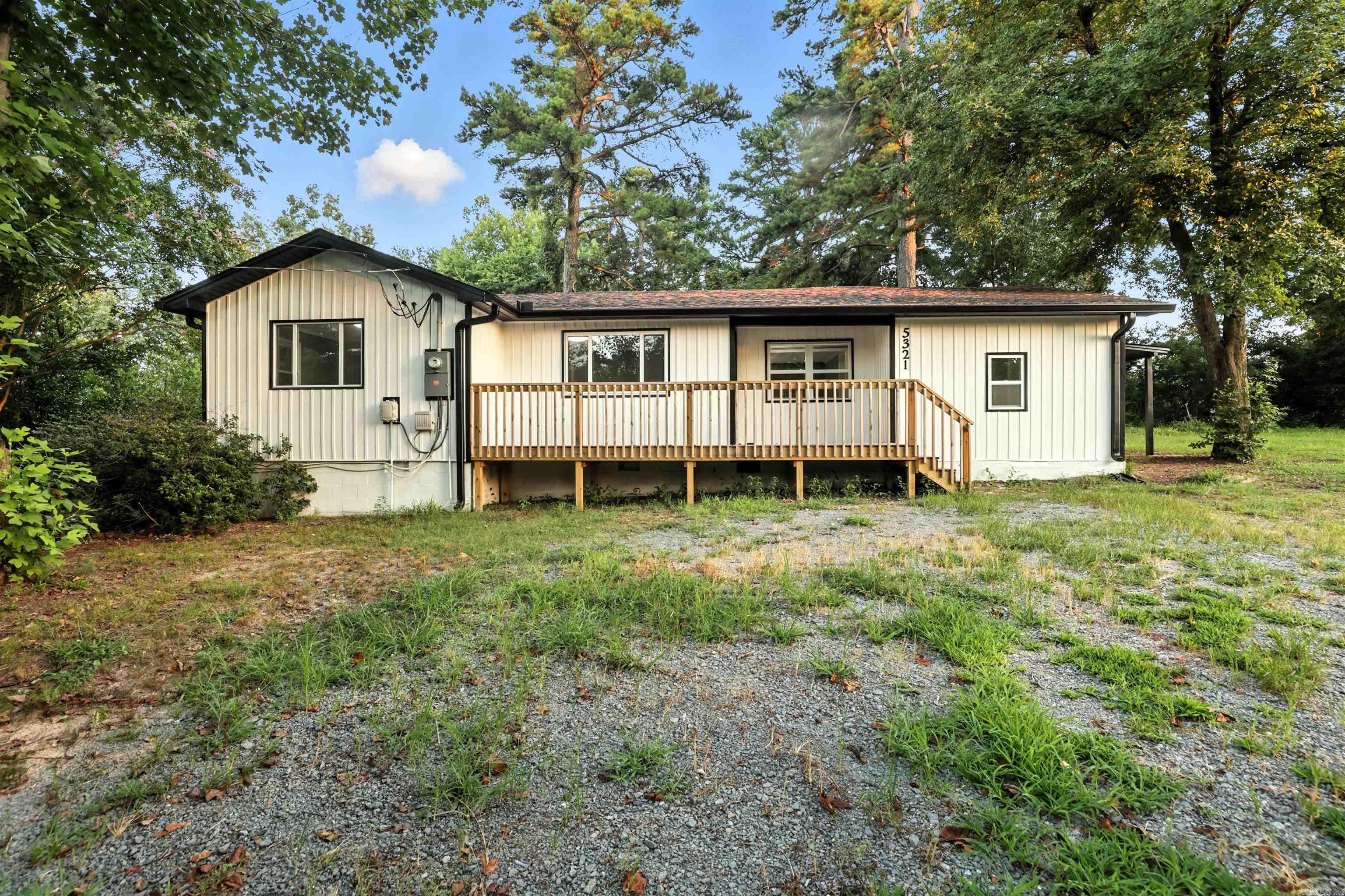 Tucked away on nearly an acre in the heart of Bauxite, this charming home offers more than just curb appealāit delivers flexibility, space, and potential to grow! There is a unique bonus area just off the kitchen and living room, that could easily serve as a luxurious primary suite. The large laundry room presents a creative opportunityāconvert it into the walk-in closet of your dreams or keep it functional with room to spare. The main living area is warm and inviting, with natural light and room to entertain. Step outside and enjoy the peace and privacy of a large, open lotāperfect for kids, pets, gardening, or even a future shop or pool! Whether youāre a first-time buyer, investor, or someone who just wants a little more space out in the county this could be it... to live, dream, and growāall just minutes from Bryant and Benton downtown shopping and dining!