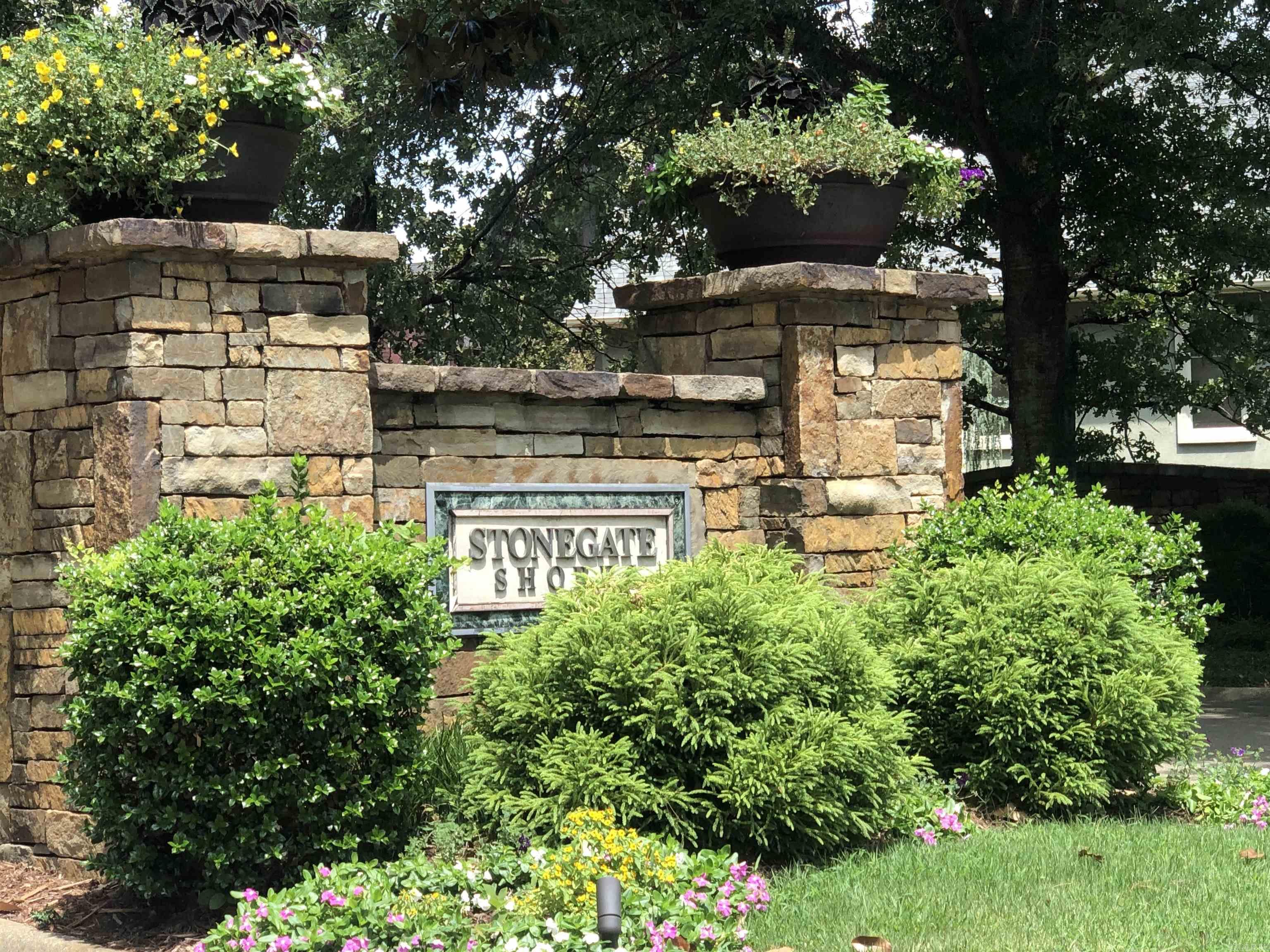 Build your dream home on the waters edge of Lake Hamilton. Located in the gated subdivision of Stonegate Shores. This lot is next door to the clubhouse and pool for easy access. Covered boat slip is included with this lot. POA amenities include access to the pool, tennis and basketball court as well as private boat launch and storage area.