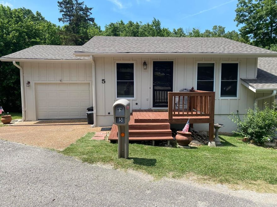 Beautiful Townhouse with Custom Kitchen and Garage Close to Indoor and Outdoor Pools. A must see this gorgeous 3 bedrooms (3rd bedroom is currently being used as an office) , 2 bath renovated townhouse with Hardwood Floors, Custom Kitchen with granite countertops and stainless steel appliances, Family room, newly painted exterior, New architectural shingles.   Move in ready!!