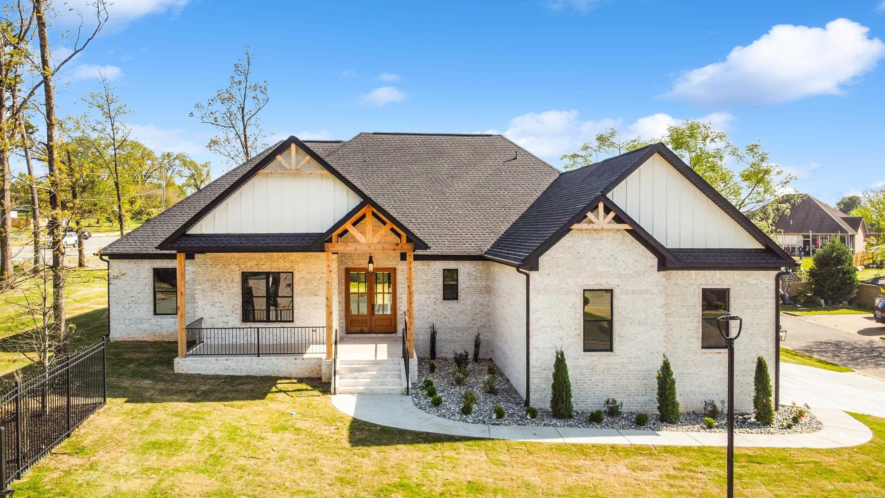 This stunning 4-bedroom, 3.5-bathroom home comes with a bonus room and a 3-car side-entry garageāperfect for extra storage! Plus additional parking and usable space as it sits beside a small cul-de-sac. Natural wood elements throughout create a warm, inviting atmosphere, while the back porch is prepped for an outdoor kitchen future expansionācomplete with a gas and water line for your future grill setup! Enjoy your outdoor space with the privacy of a fully fenced backyard, making this home as functional as it is beautiful. Primary suite offers a layout that gives tons of space as well as making chores simpler with the connecting laundry room. Split floor plan for privacy from other downstairs bedrooms. Bonus room above the garage offers a great additional living space complete with it's own bathroom. Tour this one today!