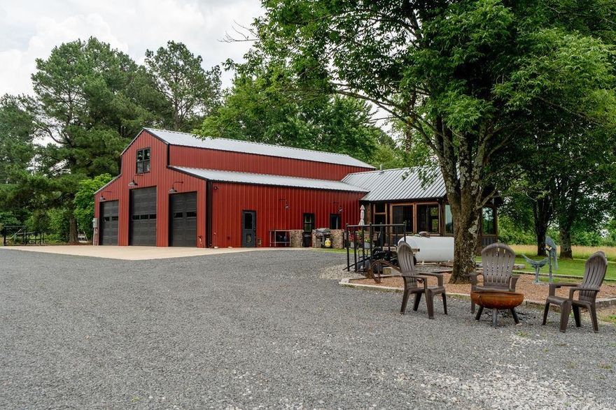 This unique property offers 71 beautiful acres with 30 acres of pasture, 40acres of rolling woods with wide trails, a refurbished pond. new well for irrigation and custom fenced garden area. The well built 48'x60' shop has 6 inch thick concrete floors, steel beam construction, foam insulation and fabulous living quarters, all combined in one great package.  The 2 bdrm / 2 bath shop home is high end with tall wood ceilings, ship lap walls, gas fireplace, plantation shutters and stained concrete floors.  The star of the show is the heated/cooled porch with vaulted ceiling, cedar posts and beams, wood burning fireplace and windows that open for a screened porch experience or close to enjoy the AC or Heat provided by a Mini-Split.  Additional features: 'world's greatest deer stand', whole house Generac generator (22kw), Anderson windows and sliding doors, an upstairs office (21' x 18') and only a few miles from Heber Springs and Greers Ferry Lake!