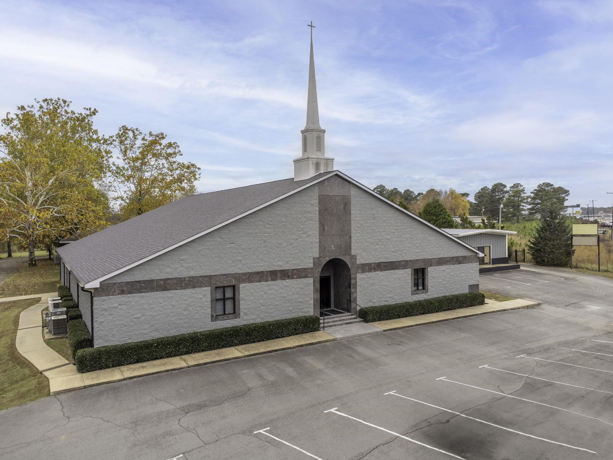 Welcome to a move-in church located in the HEART of Saline County. High visibility on I-30, recently rezoned to C-3. This campus includes a total building square footage is 13,929 sq ft.The three buildings encompass the main sanctuary, youth center with a guest apartment,& fellowship building sitting on a little over 2 acres.The glass front doors open to the foyer.Through the foyer, you will find the sanctuary, pulpit, baptistry, changing area, & choir seating.The sanctuary has a vaulted ceiling with acoustical ceiling panels. Restrooms,2 offices, and 7 classrooms are all located around the sanctuary.The stairway gives access 2nd-floor control room.The Children's center is 3,085 sq ft.This includes the main worship area, offices, 2 bathrooms & the newest addition;a guest apartment, & youth activity This area has a kitchenette and 1.5 bathrooms. The Fellowship Center is an open floor plan with 1.5 baths and with large kitchen space perfect for gatherings includes a breezeway & garage.