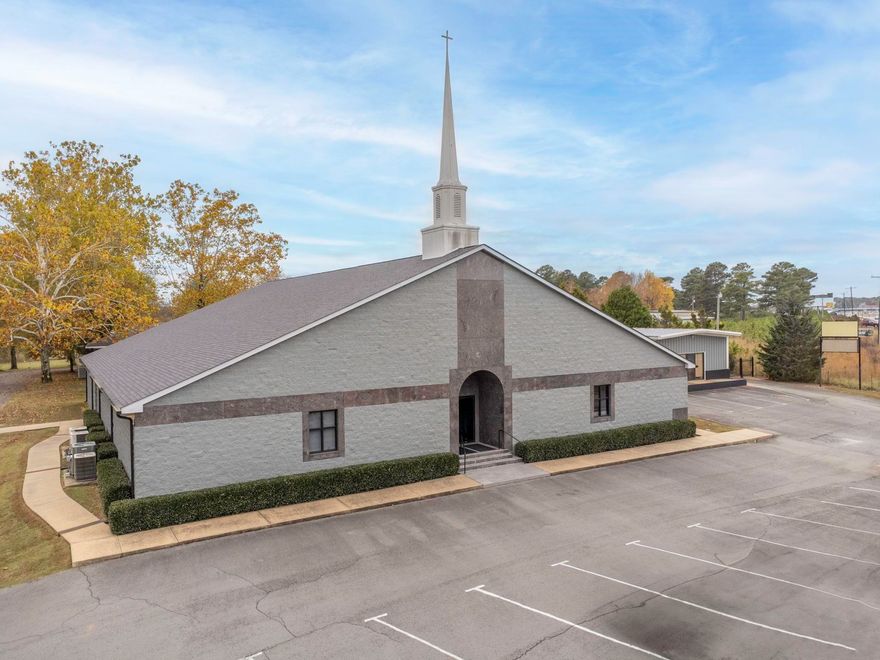 Welcome to a move-in church located in the HEART of Saline County. High visibility on I-30, recently rezoned to C-3. This campus includes a total building square footage is 13,929 sq ft.The three buildings encompass the main sanctuary, youth center with a guest apartment,& fellowship building sitting on a little over 2 acres.The glass front doors open to the foyer.Through the foyer, you will find the sanctuary, pulpit, baptistry, changing area, & choir seating.The sanctuary has a vaulted ceiling with acoustical ceiling panels. Restrooms,2 offices, and 7 classrooms are all located around the sanctuary.The stairway gives access 2nd-floor control room.The Children's center is 3,085 sq ft.This includes the main worship area, offices, 2 bathrooms & the newest addition;a guest apartment, & youth activity This area has a kitchenette and 1.5 bathrooms.  The Fellowship Center is an open floor plan with 1.5 baths and with large kitchen space perfect for gatherings includes a breezeway & garage.