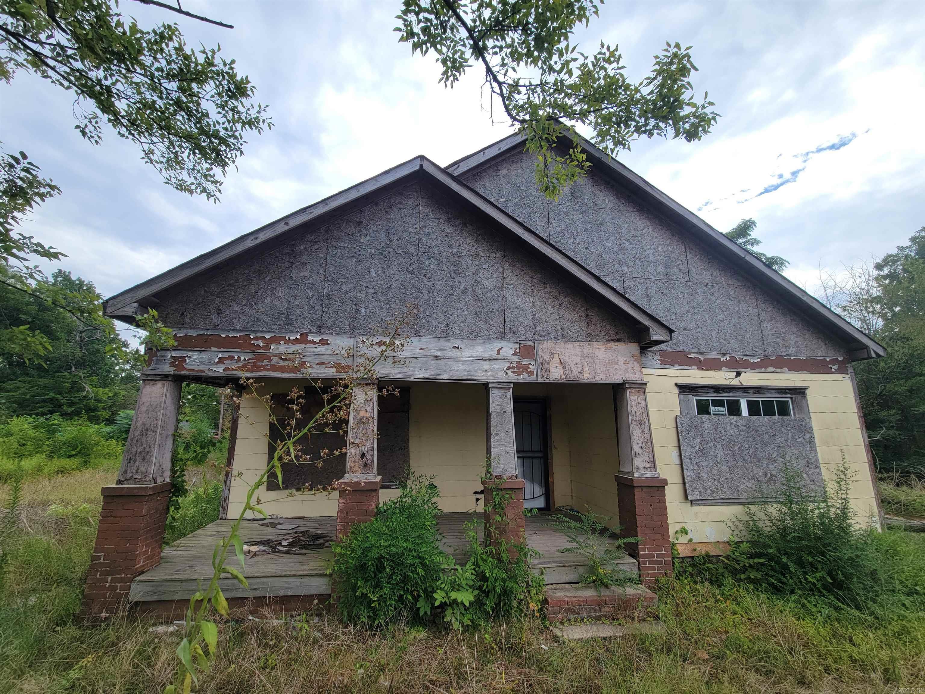 The uglier the house, the better the dealāhereās your chance at a Cumberland steal. There's no other way to put it. This house needs a LOT of work. The good: new roof decking, new duct-work, the house has been wired, plumbing has been run, new windows were installed (but some have been broken), new header in the LR, and tub & shower surround installed. The bad: Roof needs to be looked at (wind damaged shingles), exterior needs siding and paint, the grounds need a major clean-up, sheetrock work needed, interior needs paint and flooring, bathroom is incomplete, needs a parking area at the rear, and the kitchen needs everything! Bring a flashlight and your creativity. The house is being sold As-Is. No SPD. The house is located across the street from Cumberland Manor and Metropolitan Village. There are also two newer house built right next door. ***see agent remarks***