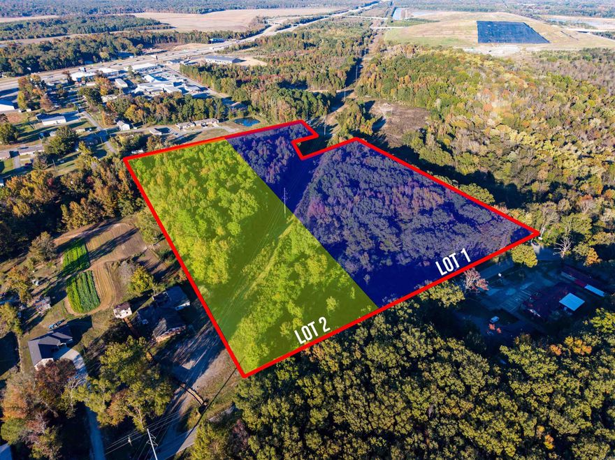 Nice level lot with utilities available and plenty of space to build. Conveniently located just off the freeway for easy access. Additional 5.95 acres available