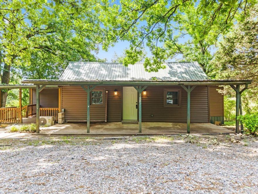 Quaint cabin on almost an acre. Fisherman's attention! Very close to Carpenter Dam Lake. Room to add another structure or two. Freshly painted. Tankless gas hot water heater. Workshop area. Carport awning does not convey.