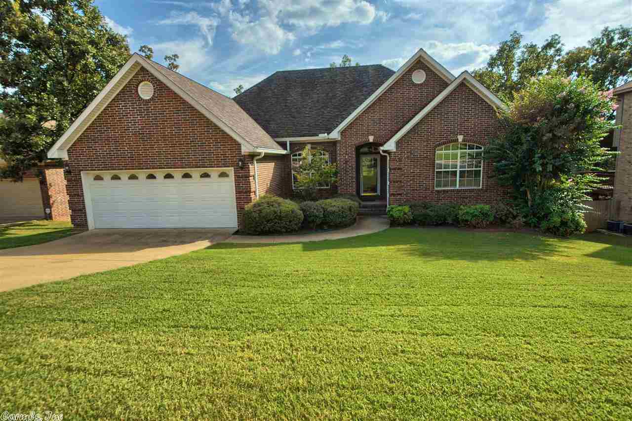 3 bedroom 3.5 bath 2018 sq ft home in Edgewater. Foyer leads to high ceilings and custom built-ins flanking each side of the gas fireplace in the living room. Separate office/formal dining just off the living room through a set of french doors. All 3 bedrooms feature walk-in closets and on-suite bathrooms. Step out back and enjoy the tree house feeling of the screened in back porch with storage underneath. Large utility room and pantry; eat-in kitchen w/new stainless appliances; & a privacy fenced yard.
