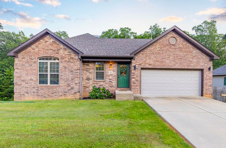 Welcome home to this spacious, move in ready home in Alexander - located close to I-30 and still in the Bryant School District! On the main level, you'll find a large living room, primary suite & kitchen/dining combo and half bath. The covered deck is perfect for entertaining with beautiful green space behind. Downstairs, you'll find 2 more bedrooms, a bathroom and exterior door to the large yard. Schedule your showing today! Agents, see remarks.