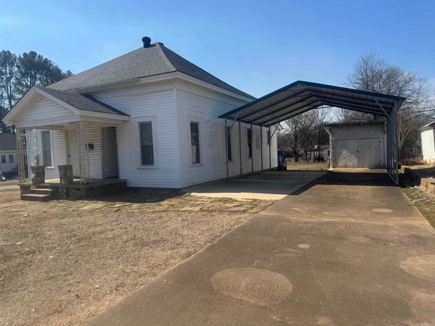 This newly remodeled house has all of the charm of yesteryear & upgrades of the present.  It sets on 2 City lots, has carport & 2 outbuildings.  Take a look.  It  won’t be on the market long.