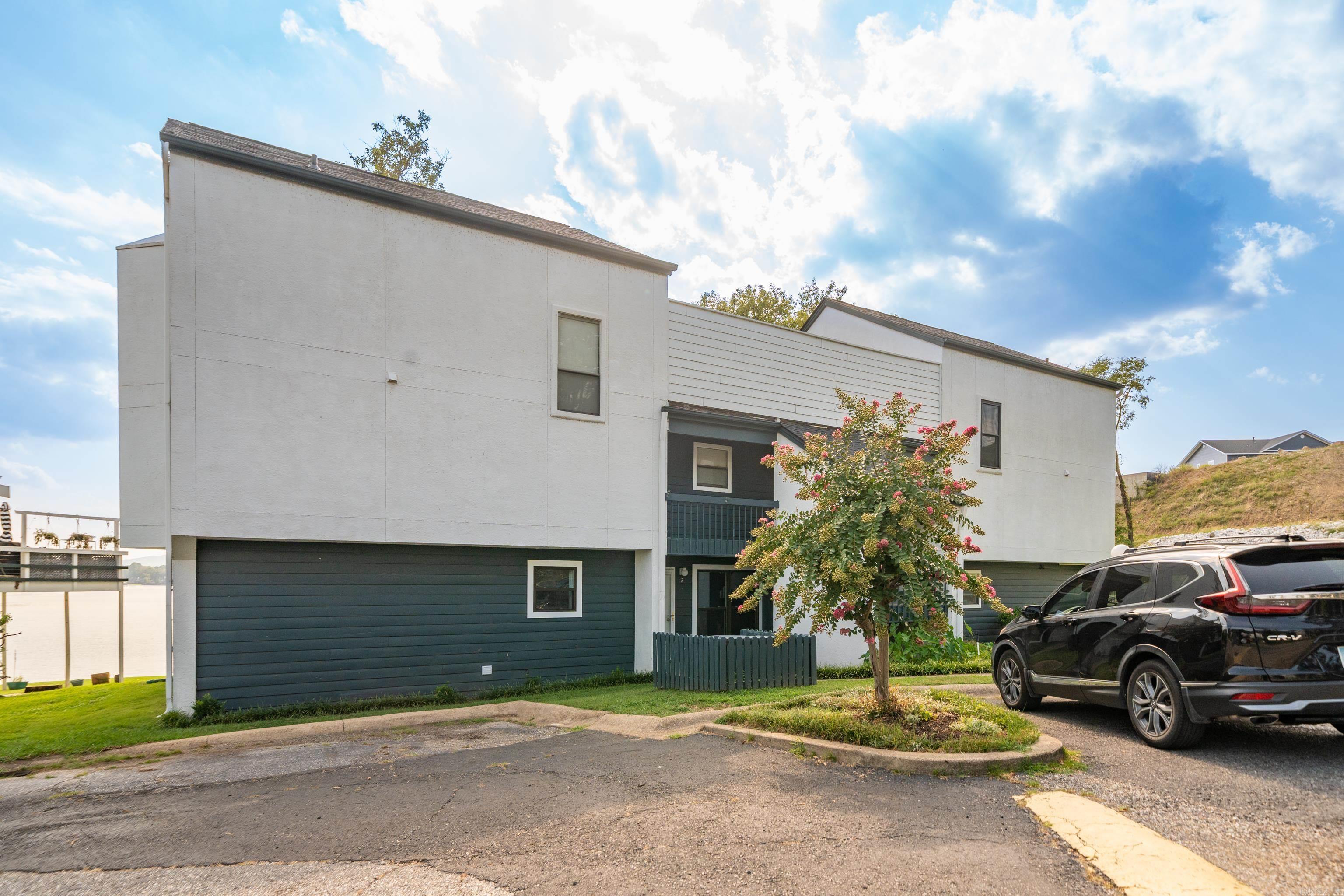 This two-story 3 bedroom, 2 bath condo on Lake Hamilton offers the ultimate lake lifestyle! Enjoy stunning water views and convenient access to the water with your boat slip, featuring a brand-new lift and the dock was built in 2024. As a bonus, a 2018 Regency 220 LE tri-toon conveys with the property ā ready for endless days of fun on the lake! Inside, the spacious layout is perfect for relaxing or entertaining, with plenty of natural light and room to gather. Primary bed and bath on the main level. Whether youāre looking for a weekend getaway or full-time lake living, this property has it all. Selling completely furnished.