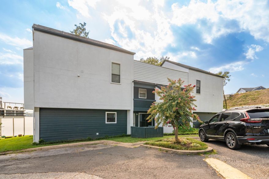 This two-story 3 bedroom, 2 bath condo on Lake Hamilton offers the ultimate lake lifestyle! Enjoy stunning water views and convenient access to the water with your boat slip, featuring a brand-new lift and the dock was built in 2024. As a bonus, a 2018 Regency 220 LE tri-toon conveys with the property — ready for endless days of fun on the lake! Inside, the spacious layout is perfect for relaxing or entertaining, with plenty of natural light and room to gather. Primary bed and bath on the main level. Whether you’re looking for a weekend getaway or full-time lake living, this property has it all. Selling completely furnished.