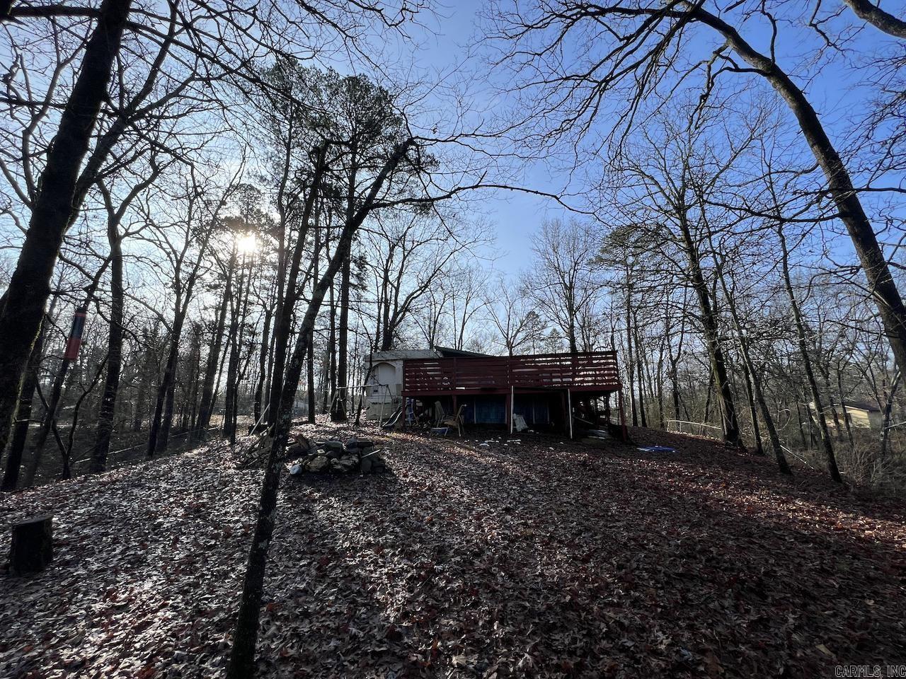 2 FIXER UPPER MOBILE HOMES, NICE BACKYARD VIEW! Sold AS IS you can move out the trailers and put a new one or build your dream home. Possible owner financing, see agent remarks.