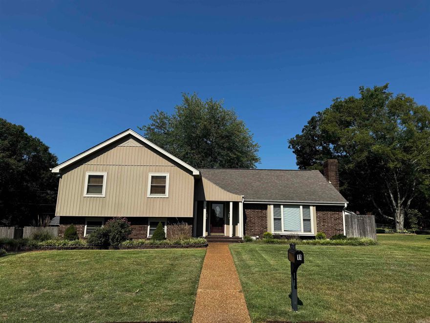 Walk into this lovely versatile home and you'll find a large living room with gas log fireplace & parquet wood floors, formal dining room with large picture window for natural light & great kitchen & breakfast room on the main floor. Downstairs hosts a huge family room with exterior exit plus the laundry room and a half bath. Up a few steps you'll find 2 guest bedrooms, the primary suite featuring 3 closets & doors that lead to a large deck overlooking a gorgeous fenced backyard with mature trees.  There is also another bonus room/4th bedroom as well featuring two large walk-in closets for extra storage. Other features include crown molding, sprinkler system, outdoor storage, laminate floors, stainless appliances, ample closet space, laundry chute, solid wood doors, & more! So much space to spread out and call your "home sweet home"! Call today for your tour!