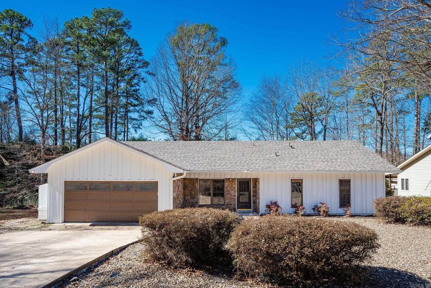 Nestled in the Gated Community of Hot Springs Village see why 17 Frontera is your next home.  From the moment you walk in, you’ll notice the comfortable flow of the living spaces, natural light, and a layout that just feels easy to live in.  The living area is inviting & perfect for relaxing evenings or hosting friends and family. The UPDATED Kitchen offers plenty of workspace and storage, making everyday cooking simple and convenient. The primary suite provides a quiet retreat at the end of the day with a large walk in shower, while additional bedrooms offer flexibility for guests, hobbies, or a home office. NEW ROOF, Fresh Paint, Floors, Updated Bathrooms & Kitchen with Stainless Appliances.  Step outside & enjoy the natural surroundings Hot Springs Village is known for, from sipping coffee in the morning or unwinding in the evening on the NEW spacious desk, this home offers a calm and cozy setting to enjoy it all. Located close to lakes, golf courses, walking trails, and community amenities, including a community pool and basketball courts, this home gives you the opportunity to enjoy both comfort and lifestyle. Come see why 17 Frontera could be the perfect place to call home.